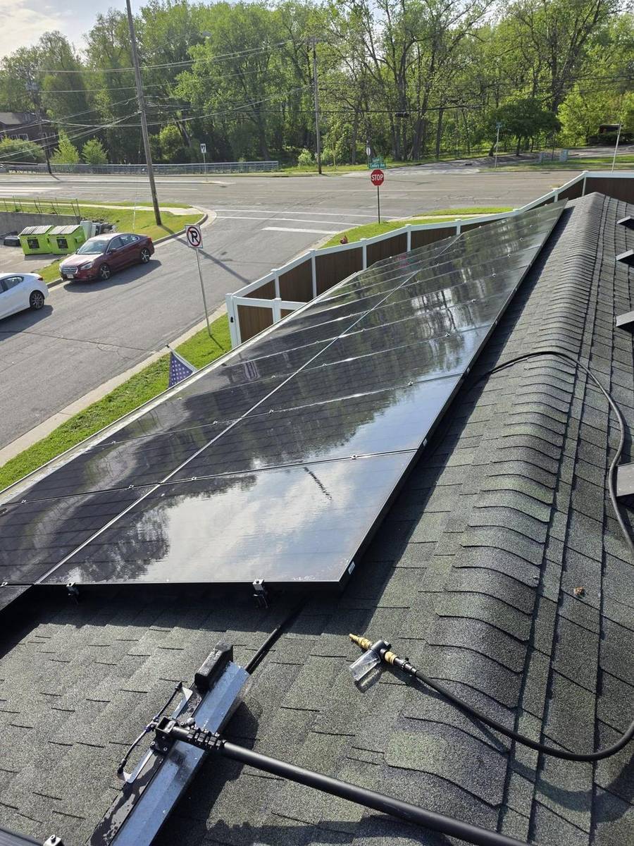 Same Southern Wisconsin residential solar array after cleaning — crystal clear