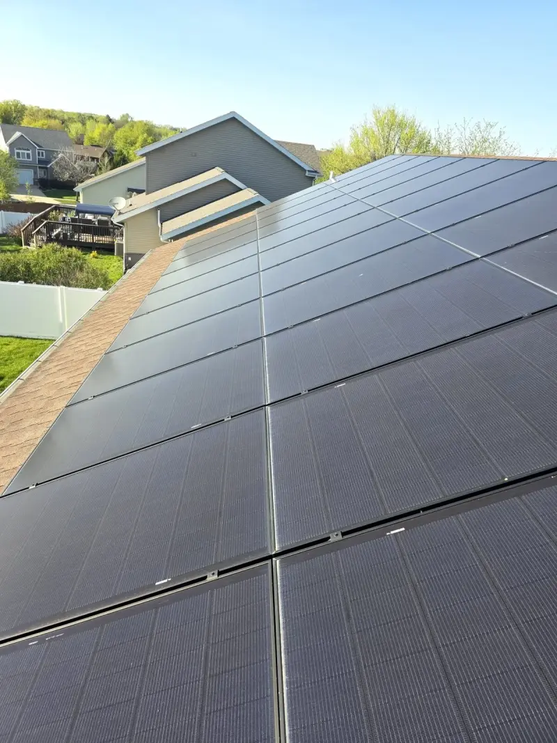 My own Madison WI solar panels the day before cleaning, showing pollen, dust, and mineral film across the glass