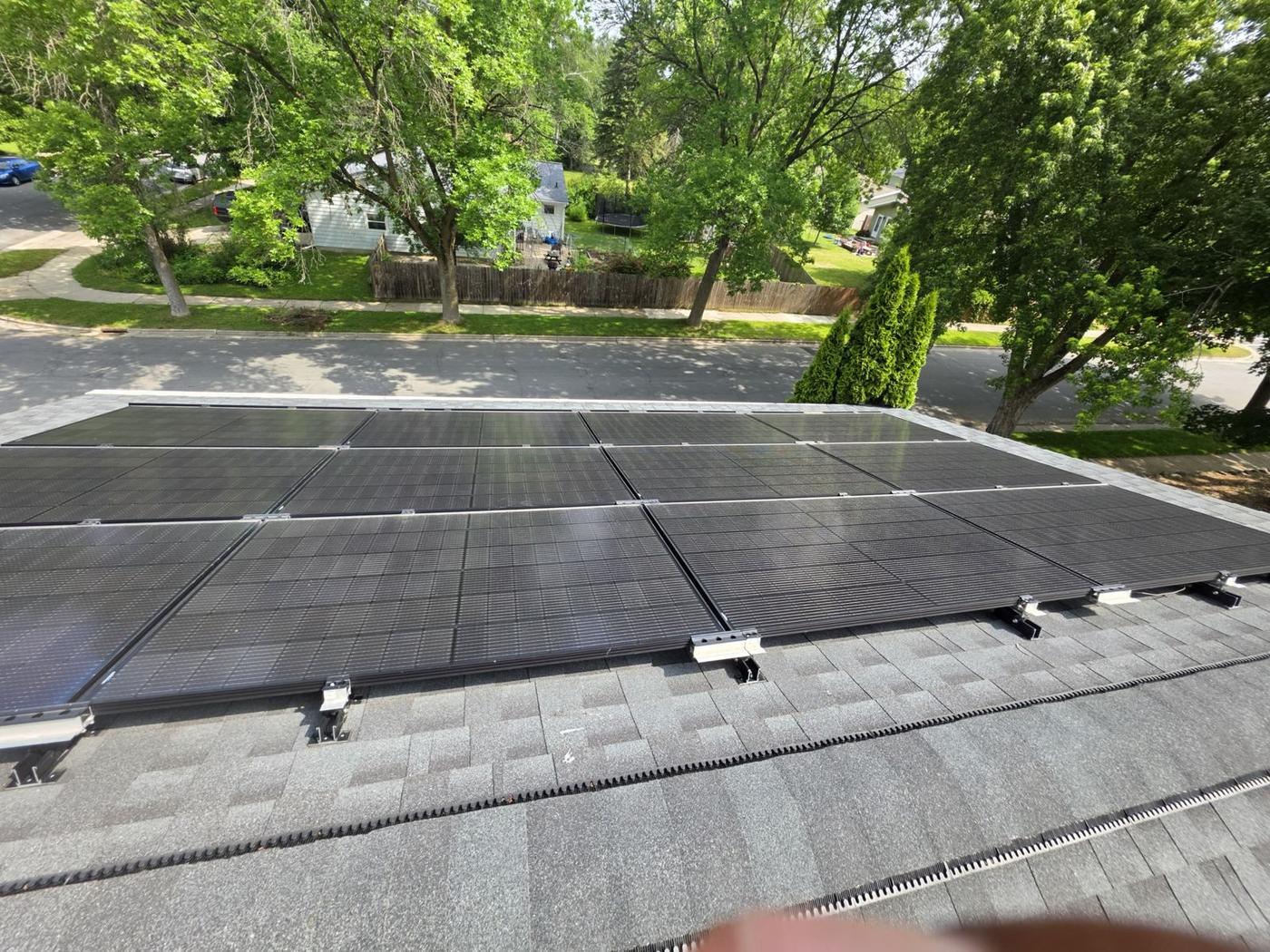 Residential solar panels covered with spring pollen and city dust — dull surface